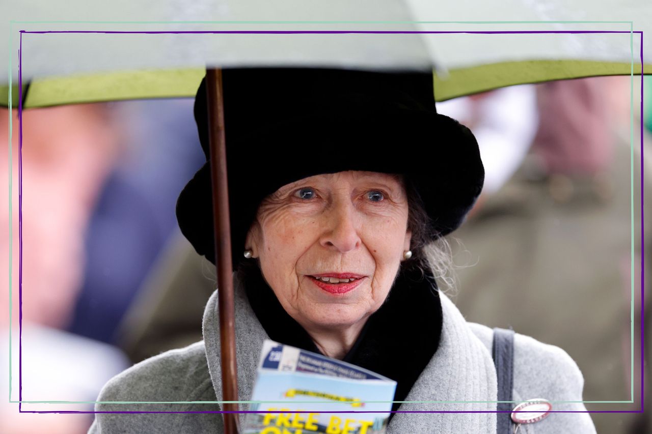 A close up of Princess Anne holding an umbrella