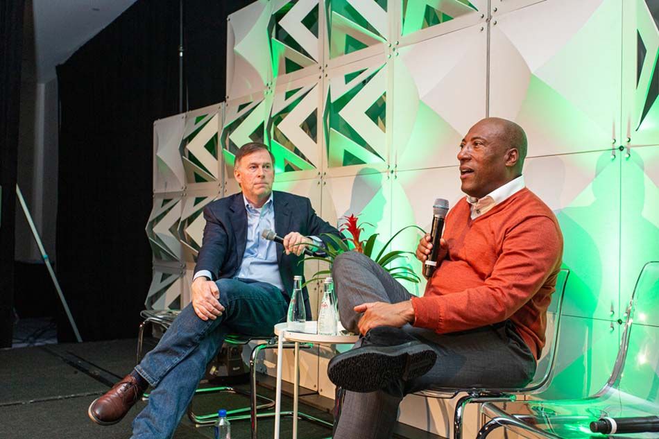 Interviewer Tim Hanlon, founder and CEO of The Vertere Group, with midday keynoter Byron Allen, founder, chairman and CEO of Allen Media Group.