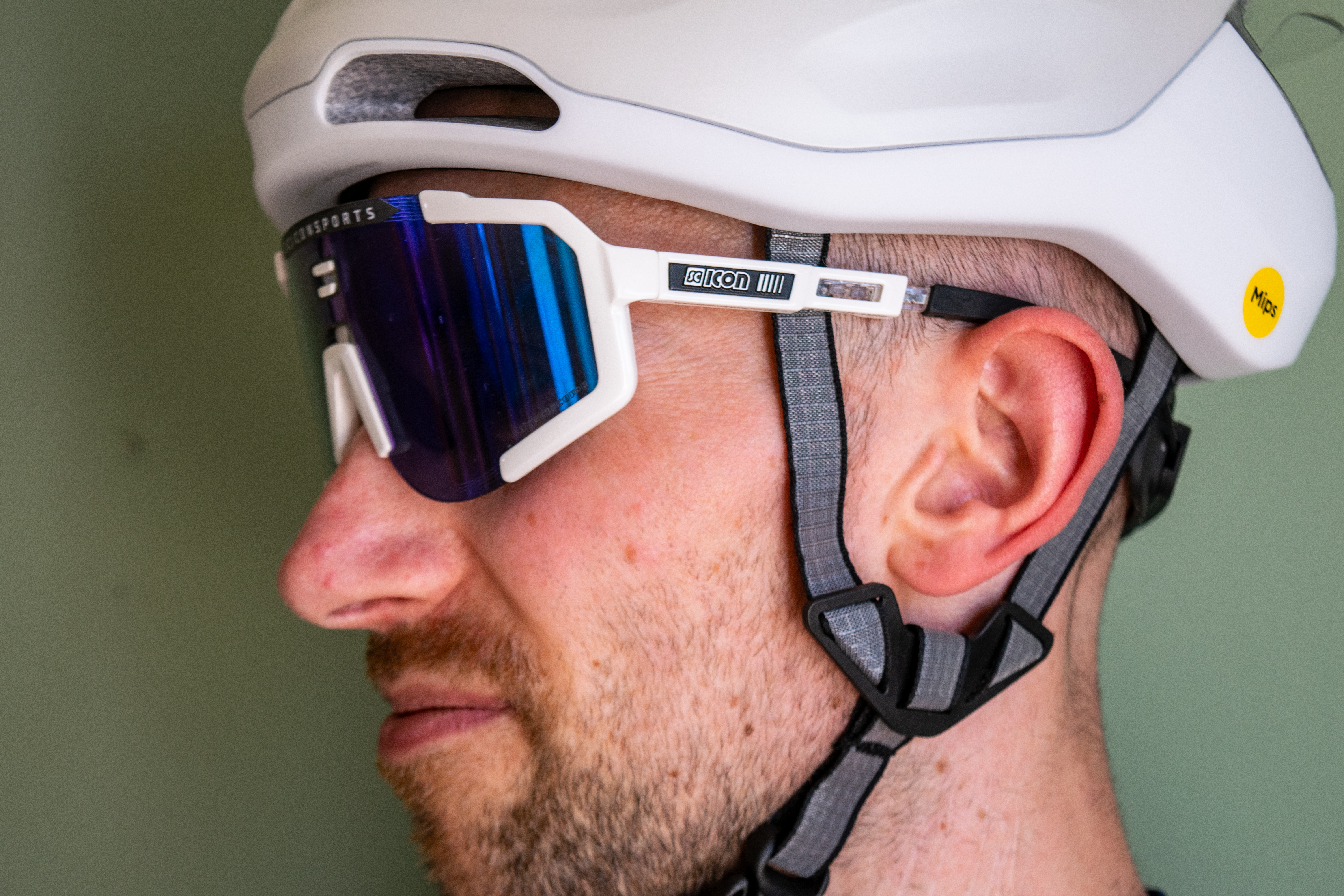 A man wearing a pair of scicon aeroscope sunglasses