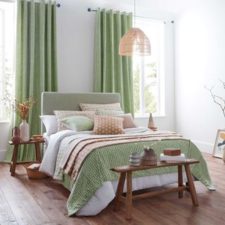 green curtains in bedroom