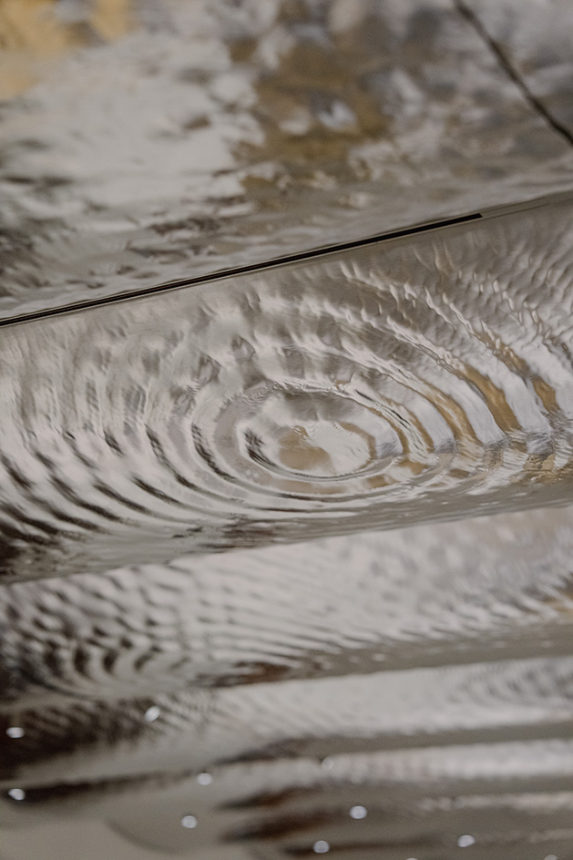 view of installation at casa batllo with a rippling ceiling