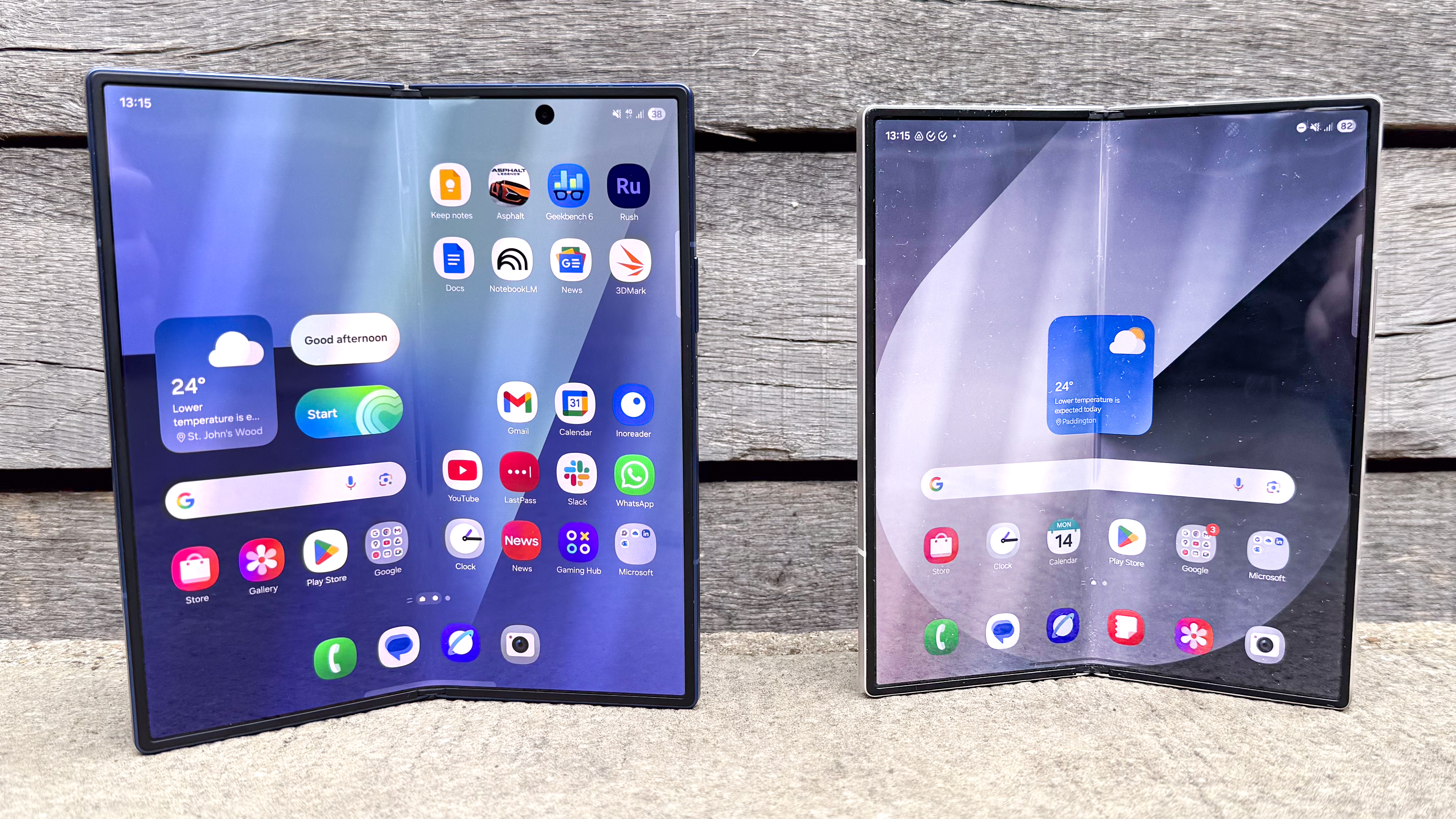 The Samsung Galaxy Z Fold 7 (blue, L) and Galaxy Z Fold 6 open and showing their inner displays