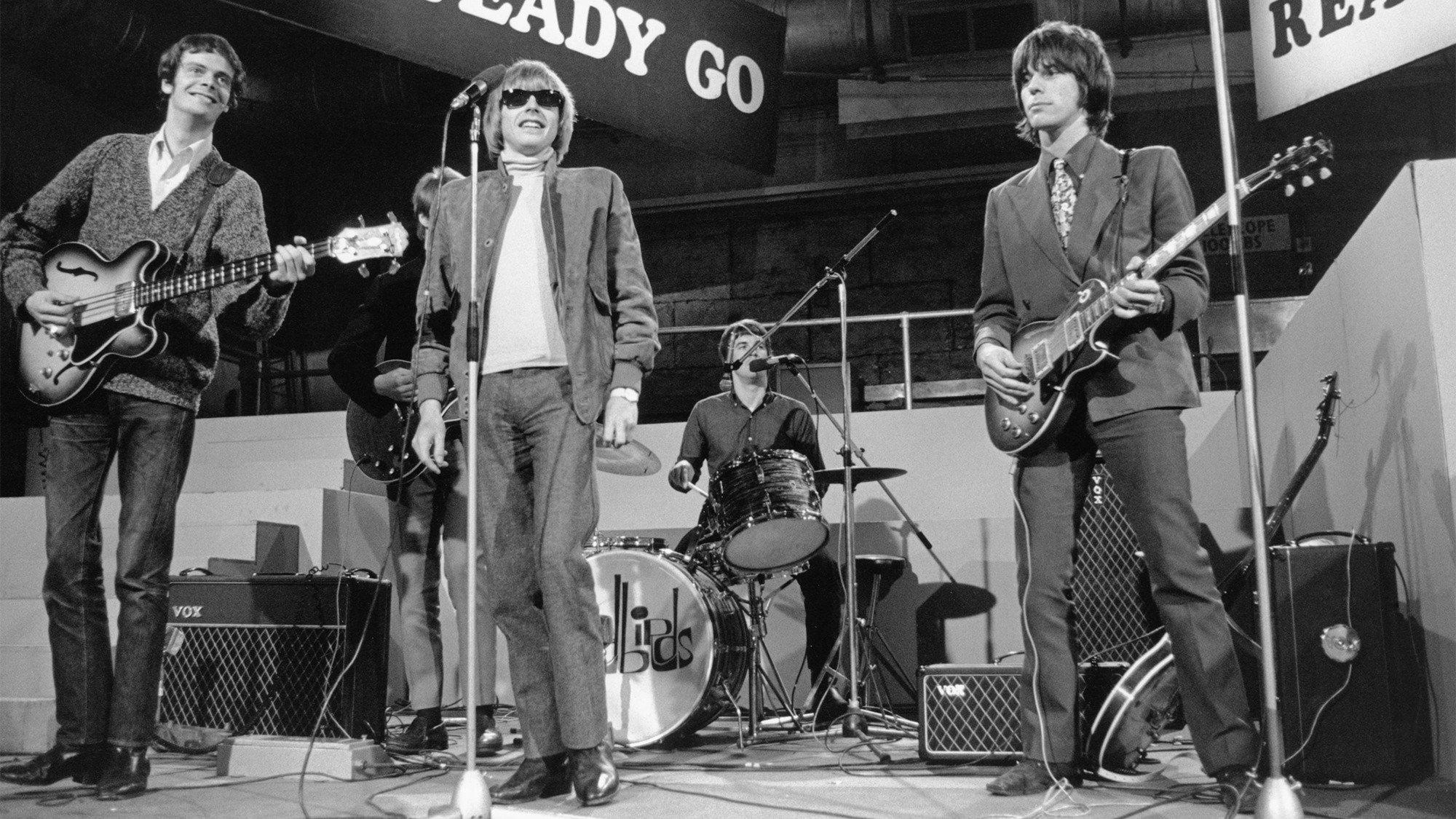 English rock group The Yardbirds perform their song &#039;Over Under Sideways Down&#039; on the set of the Associated Rediffusion Television pop music television show Ready Steady Go! at Wembley Television Studios in London on 27th May 1966. Members of the group are, from left, Paul Samwell-Smith, Chris Dreja (behind), Keith Relf, Jim McCarty and Jeff Beck.