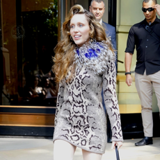 Miley Cyrus looked gorgeous as she exited her hotel in Paris, taking a moment to greet excited fans and sign autographs during her stylish outing in the city.