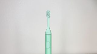 SURI Sustainable Electric Toothbrush, a close-up photo of the brush head