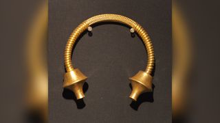 The Torques de Burela, a gold torque housed at the Provincial Museum of Lugo, which is similar to the one recently discovered in Spain.