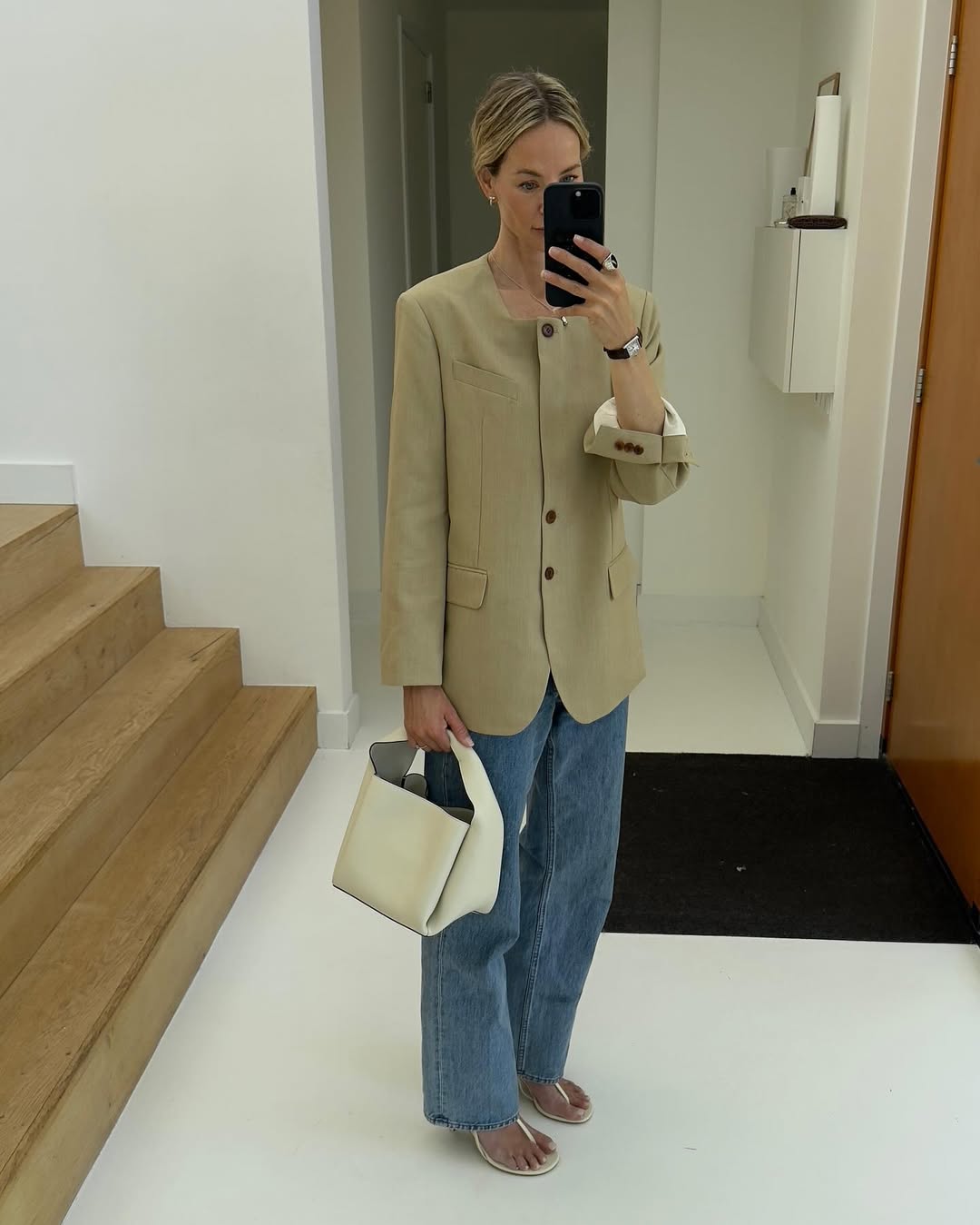 @anoukyve wearing a blazer and jeans