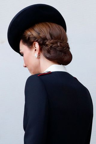 Kate Middleton headshot with a braided bun hairstyle
