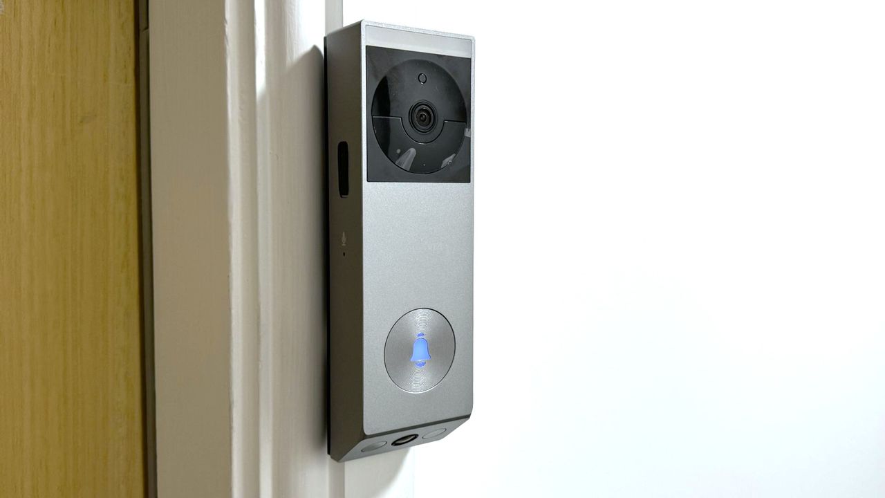 EZViz EP3x Pro video doorbell mounted beside door