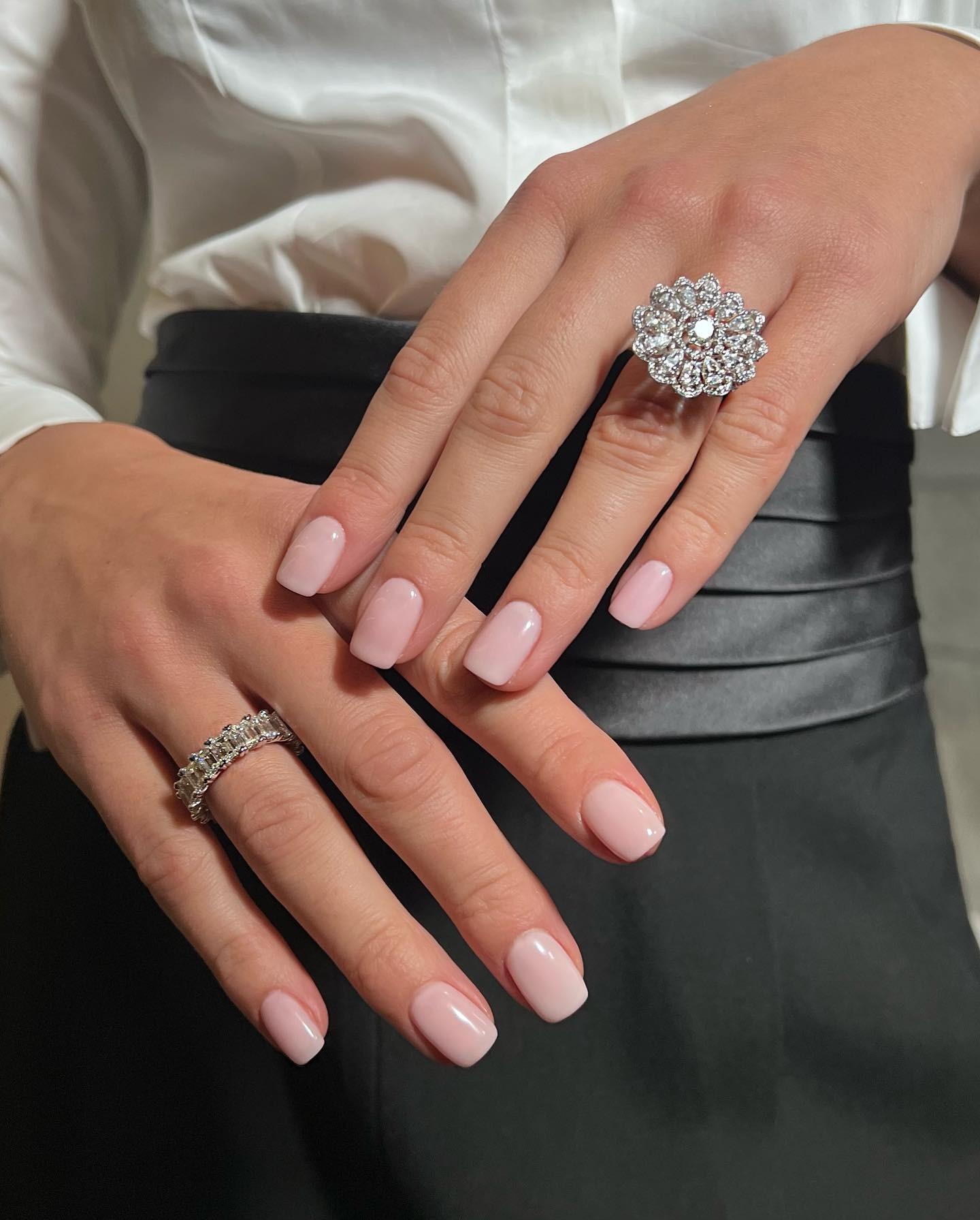 A manicure by Iram Shelton featuring OPI Funny Bunny and Bubble Bath layered