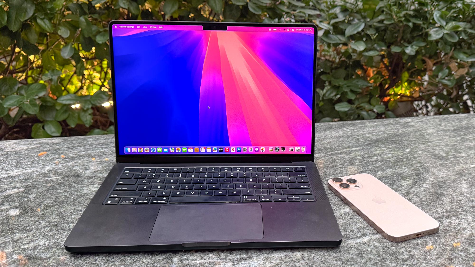 MacBook Pro 14-inch (2024, M4) shown open on a table