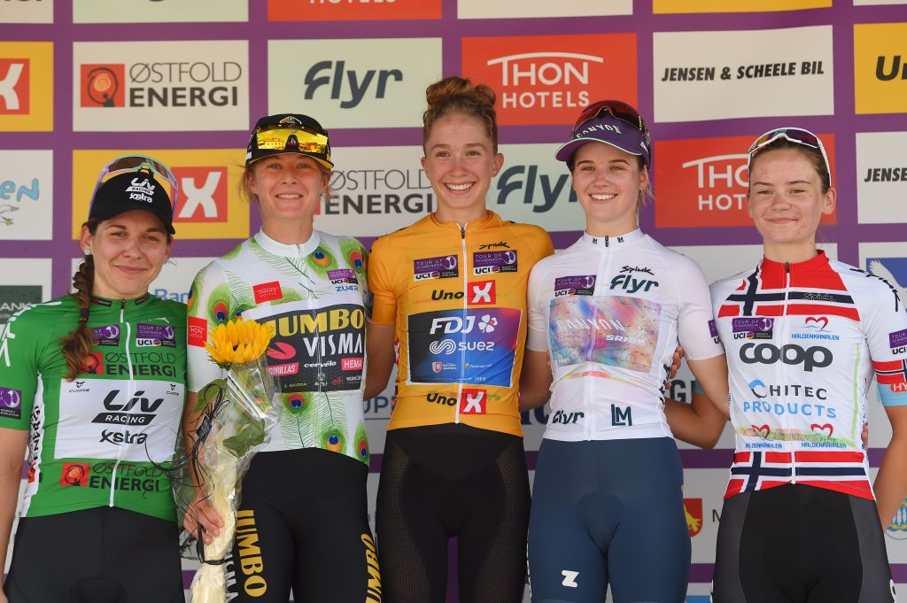 HALDEN NORWAY AUGUST 14 LR Alison Jackson of Canada and Team Liv Racing Xstra Green Points Jersey Amber Kraak of Netherlands and Jumbo Visma Team Queen of the mountains jersey Cecilie Uttrup Ludwig of Denmark and Team FDJ Nouvelle Aquitaine Futuroscope Yellow Leader Jersey Neve Bradbury of Australia and Team CanyonSRAM Racing White Best Young Jersey and Mari Hole Mohr of Norway and Team Coop Hitec Products Best Norwegian Jersey celebrate at podium after the 8th Tour of Scandinavia 2022 Battle Of The North Stage 6 a 1543km stage from Lillestrm to Halden UCIWWT tourofscandinavia TOSC22 on August 14 2022 in Halden Norway Photo by Luc ClaessenGetty Images