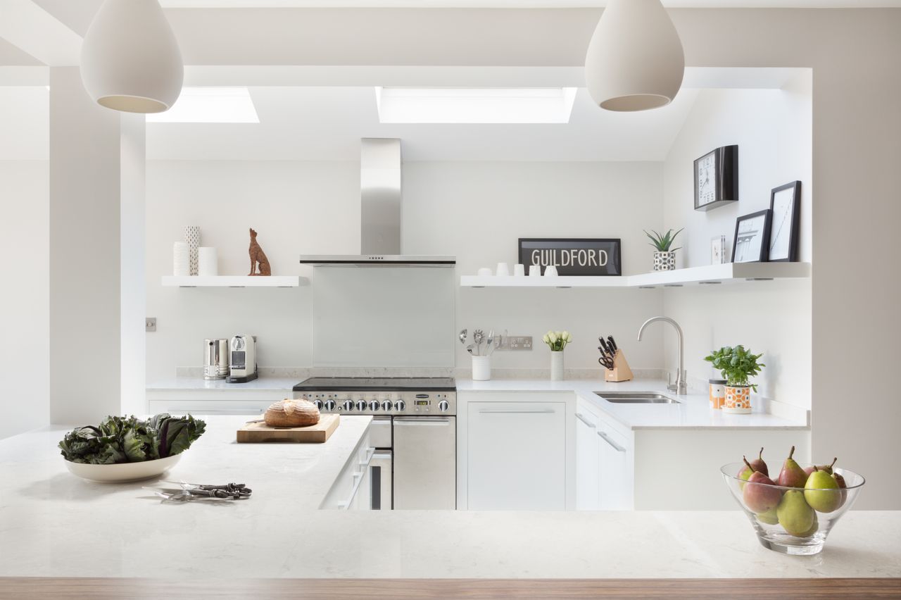 L-shaped white kitchen