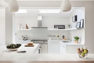 L-shaped white kitchen