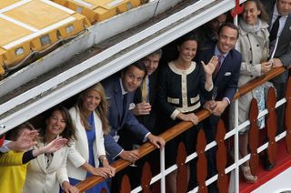 Carol Middleton, Charlie Gilkes, Michael Middleton, Pippa Middleton and James Middleton wave from the Spirit of Chartwell during the Diamond Jubilee Thames River Pageant