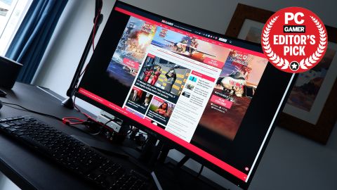 Gigabyte M32UC gaming monitor on a desk with PC Gamer Recommended badge