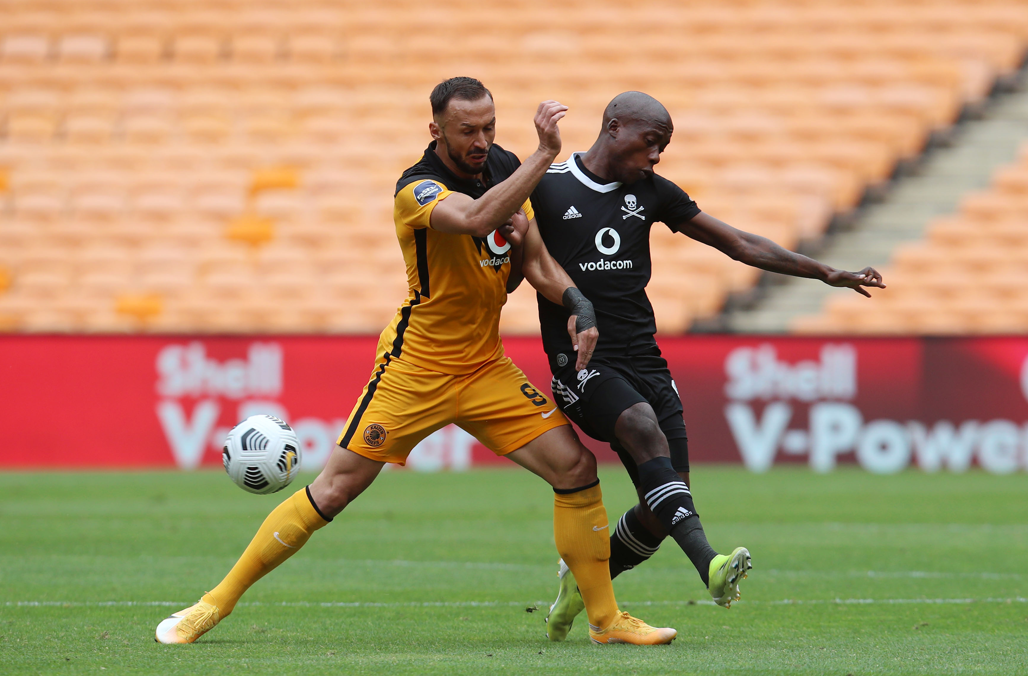 Samir Nurkovic of Kaizer Chiefs challenged by Ben Motshwari of Orlando Pirates