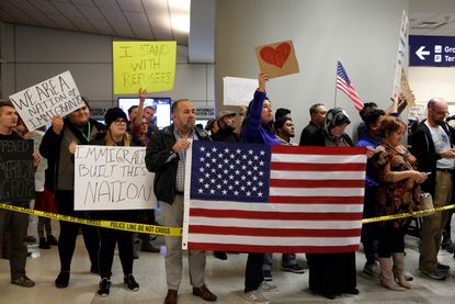 Protesters outside Dallas-Fort Worth International airport 