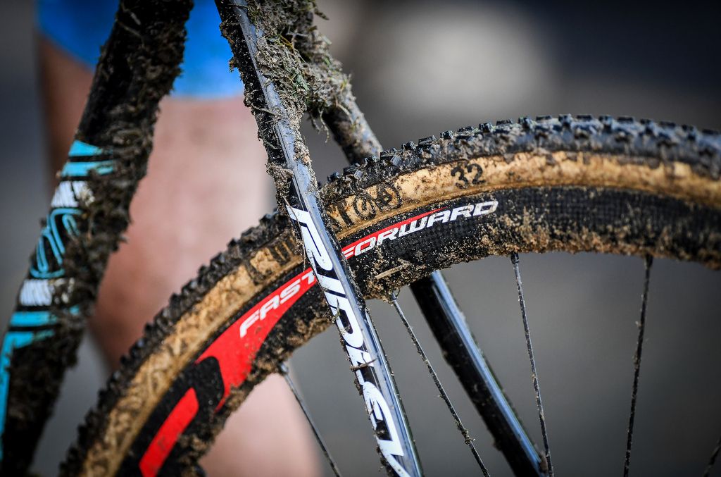 A race bike showing the amount of mud the riders pick up during the race