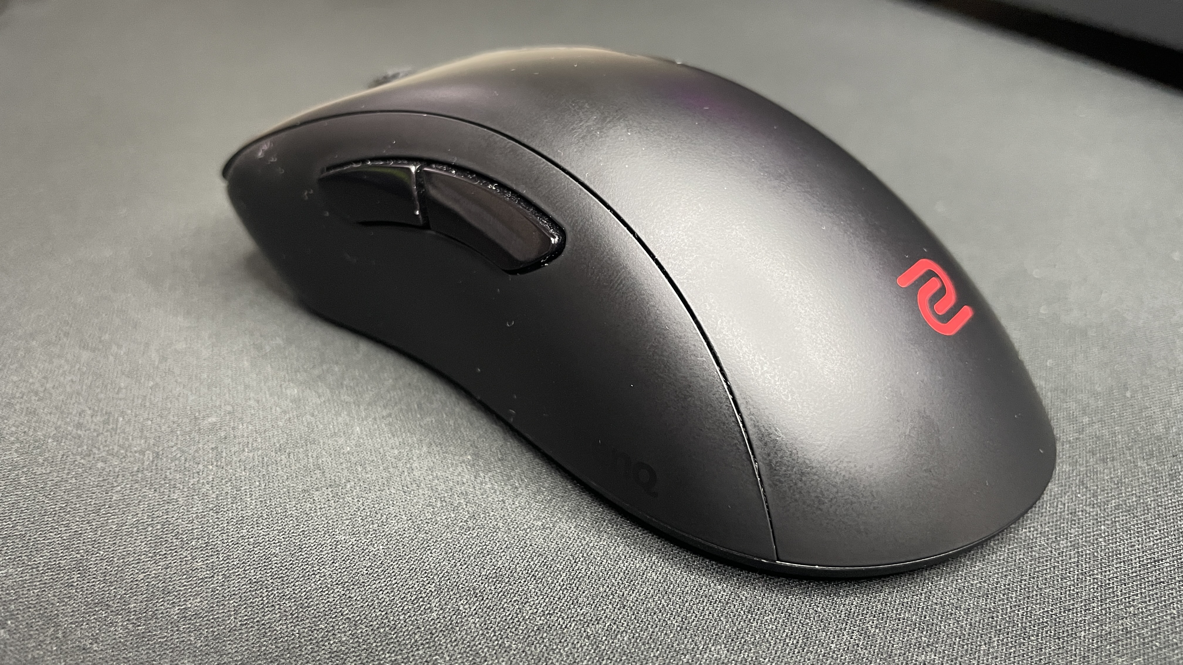 A Zowie EC2-DW gaming mouse.