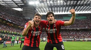 Brahim Diaz and Sandro Tonai celebrate AC Milan's win over Atalanta at San Siro.