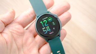 Close-up of the Garmin Vivoactive 6 smartwatch in green