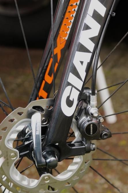 This version of the TCX still uses conventional quick release skewers, unlike one of the consumer models which features a front thru axle