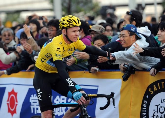 Chris Froome (Sky) greets the fans after his win