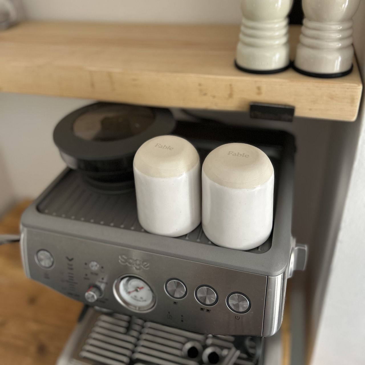 Coffee cups on top of my coffee machine