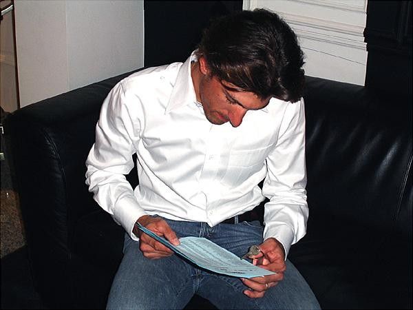 Fabian Cancellara inspects the results sheet. "Hey, I got first!"