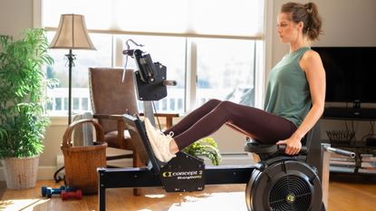 Concept2 StrengthErg being used by a woman