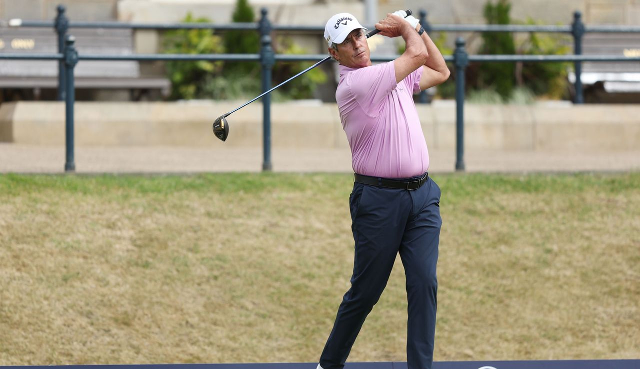 Baker-Finch hits a tee shot at St Andrews