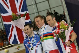 Chris Hoy on the top spot of the men's kilo podium flanked by Francois Pervis (France) and Jamie Staff (Great Britain)
