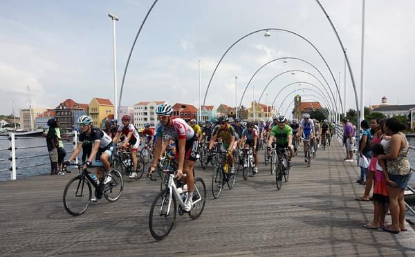 The riders head across the bridge