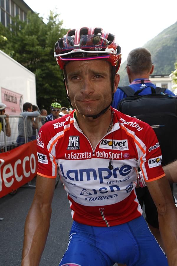 Michele Scarponi (Lampre-ISD) looking concerned about his teammate's result.