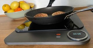 one of the best portable induction hobs being tested by Rosie for the womanandhome.com review guide