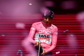 PRATI DI TIVO ITALY MAY 11 Tadej Pogacar of Slovenia and UAE Team Emirates celebrates at podium as Pink Leader Jersey winner during the 107th Giro dItalia 2024 Stage 8 a 152km stage from Spoleto to Prati di Tivo 1451m UCIWT on May 11 2024 in Prati di Tivo Italy Photo by Dario BelingheriGetty Images