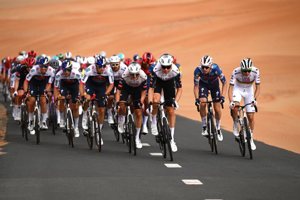 LIWA PALACE ABU DHABI UNITED ARAB EMIRATES FEBRUARY 17 Florian Vermeersch of Belgium and Tadej Pogacar of Slovenia and UAE Team Emirates lead the peloton during the to the 7th UAE Tour Stage 1 a 138km stage from Madinat Zayed Shams Solar Park to Liwa Palace UCIWWT on February 17 2025 in Liwa Palace Abu Dhabi United Arab Emirates Photo by Dario BelingheriGetty Images