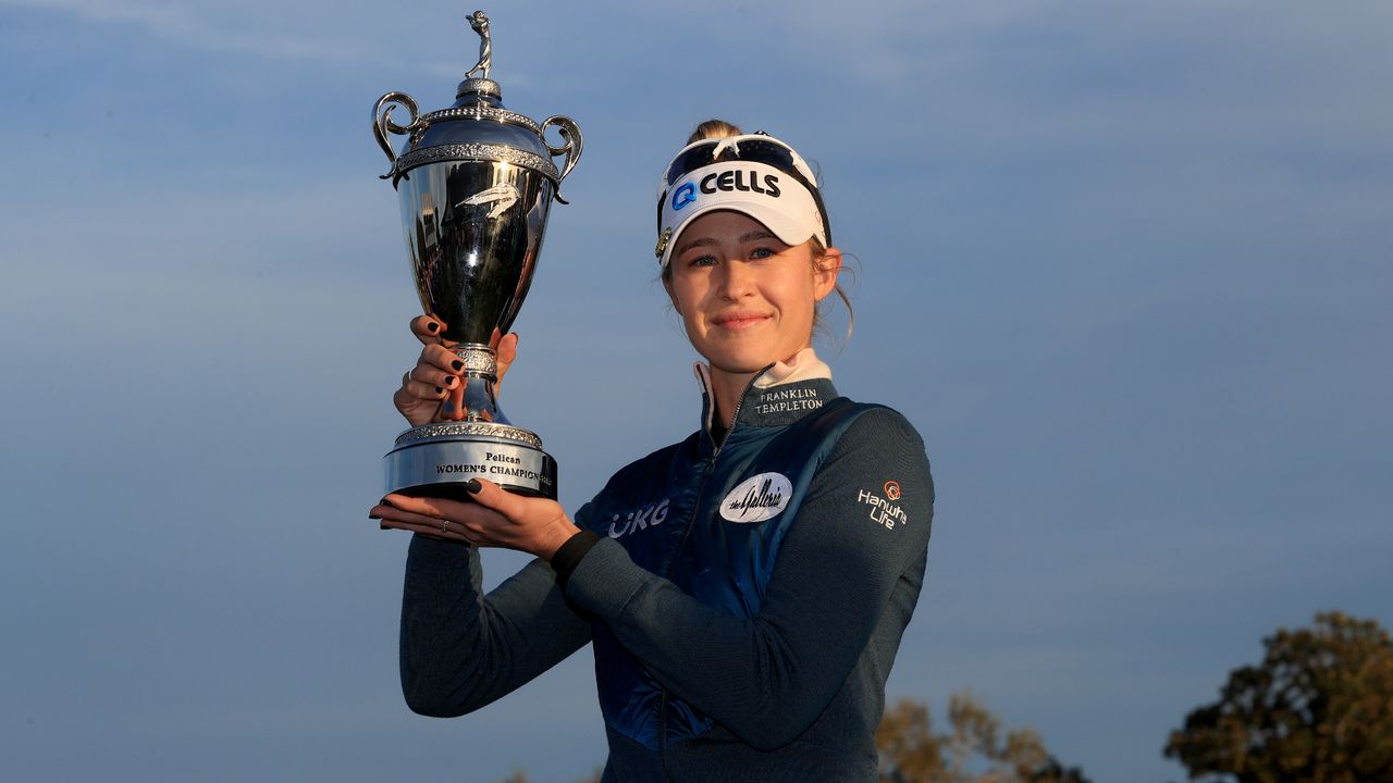 Nelly Korda with the trophy after winning the 2021 Pelican Women&#039;s Championship