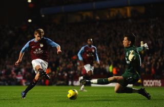 Marc Albrighton scores for Aston Villa against Arsenal in December 2011.