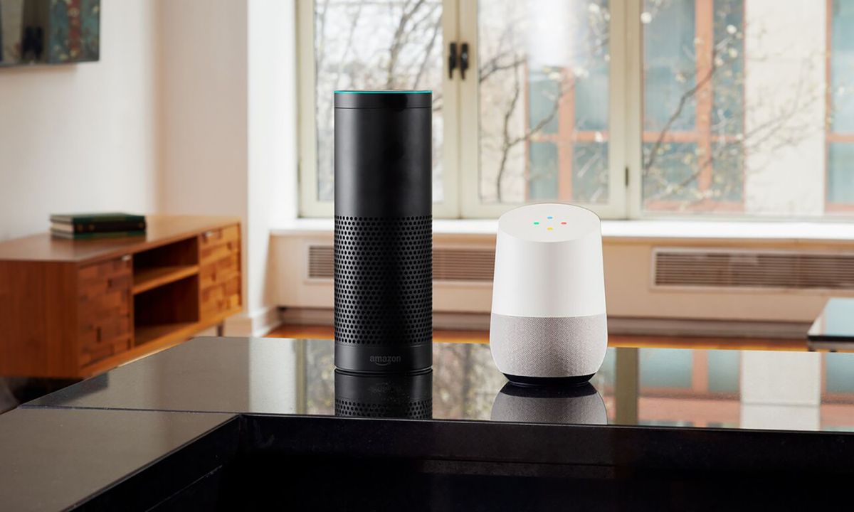 A first-generation Amazon Echo and a Google Home device.