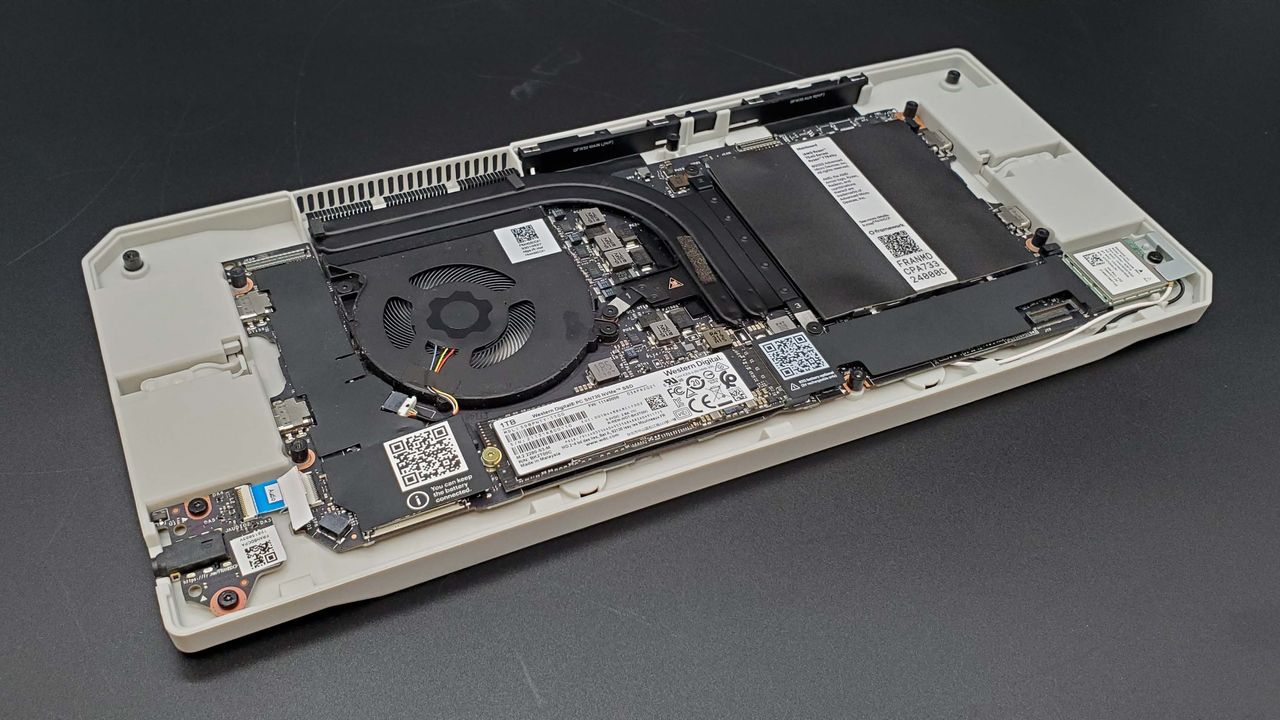Framework AMD mainboard running in a Cooler Master chassis, with SteamOS on it
