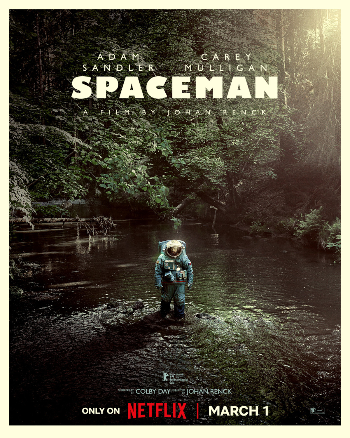 an astronaut in a bulky spacesuit stands in a stream in a forest