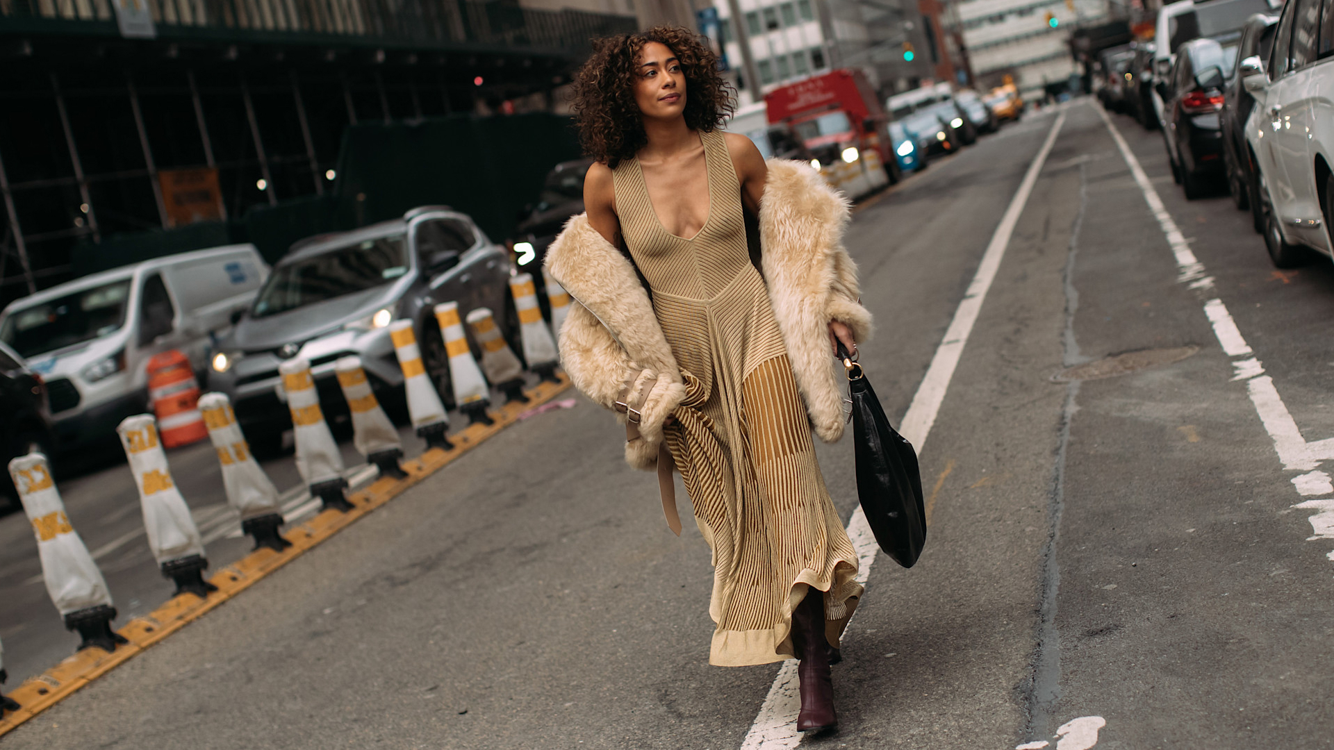 woman walking in leather boots