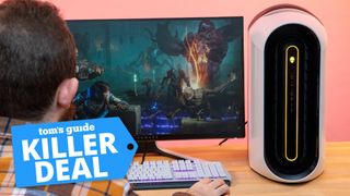 Alienware Aurora R10 Ryzen Edition on a desk with a Tom's Guide deal tag