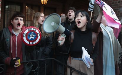 Students protest a visit by Corey Lewandowski, President Trump's former campaign manager, at the University of Chicago.