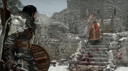 A screenshot of Macduff fighting the Staglord in the Crimson Desert trailer. 