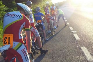 Riders wait in line before being set off for a time trial
