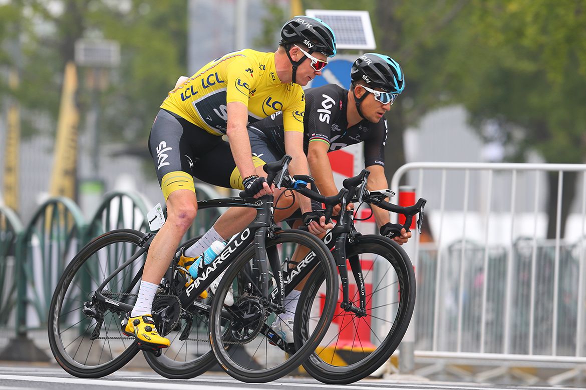 Chris Froome rides alongside Michal Kwiatkowski