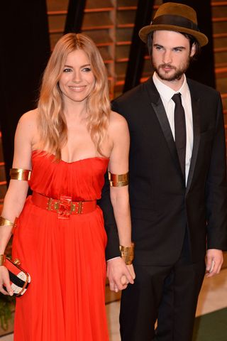 Sienna Miller And Tom Sturridge At The Oscars 2014